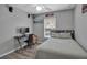 Cozy bedroom featuring a bed, window, and desk setup, perfect for work or rest at 4673 Lummus St, North Port, FL 34286