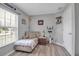 Bedroom features a couch, exercise bike, and natural light at 4673 Lummus St, North Port, FL 34286