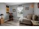 Bedroom with an interesting Boston sports theme, lots of light, and wood flooring at 4673 Lummus St, North Port, FL 34286