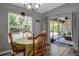 Breakfast nook with abundant natural light and access to the outdoor patio at 4673 Lummus St, North Port, FL 34286