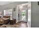 Bright entryway featuring wood flooring and a view to the exterior at 4673 Lummus St, North Port, FL 34286