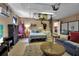 Converted garage features a living area, sleeping area, and access to the laundry room, creating a unique living space at 4673 Lummus St, North Port, FL 34286