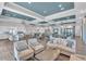 Open concept clubhouse features a gourmet kitchen, fireplace, dining area, and elegant seating for social gatherings at 4704 Stafford Ct, Palmetto, FL 34221