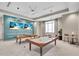 Game room with billiard and ping pong table, TV's and lounging spot at 4704 Stafford Ct, Palmetto, FL 34221