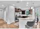 Open concept kitchen, stainless appliances, and breakfast bar make entertaining easy at 4704 Stafford Ct, Palmetto, FL 34221
