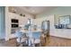 Bright kitchen boasts stainless steel appliances, granite countertops, and stylish breakfast bar seating at 4704 Stafford Ct, Palmetto, FL 34221