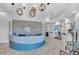 Elegant reception area with modern design, tiled floors, and stylish light fixtures at 4704 Stafford Ct, Palmetto, FL 34221