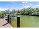 Scenic waterfront with private dock and boat lift at 4964 Commonwealth Dr, Sarasota, FL 34242