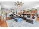 Spacious living room featuring hardwood floors and stylish decor at 4964 Commonwealth Dr, Sarasota, FL 34242