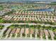 Pristine lakes and a meticulously maintained golf course highlight this beautiful planned community from above at 5019 Serata Dr, Lakewood Ranch, FL 34211