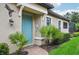 Beautiful home featuring an inviting front door, lush landscaping, and a welcoming pathway at 5019 Serata Dr, Lakewood Ranch, FL 34211