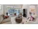 An inviting living room with a view to the lanai and open floor plan; a great place to relax or entertain guests at 5032 Timber Chase Way, Sarasota, FL 34238