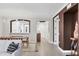 Open living room with stylish furnishings and an archway view into the kitchen area at 5238 Manorwood Dr # 3C, Sarasota, FL 34235