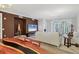 Open floor plan with living and dining room spaces featuring contemporary furnishings and decor at 5238 Manorwood Dr # 3C, Sarasota, FL 34235
