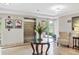 Well-maintained lobby area featuring a decorative table with floral arrangement and comfortable seating at 5238 Manorwood Dr # 3C, Sarasota, FL 34235