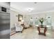 Elegant lobby with comfortable seating, soft lighting, and tasteful decor creating a welcoming atmosphere at 5238 Manorwood Dr # 3C, Sarasota, FL 34235