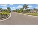 View of the Promenade Estates gated community entrance at 5715 Woodland Sage Dr, Sarasota, FL 34238