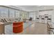 An open floor plan connecting the living room, dining area, and kitchen at 5715 Woodland Sage Dr, Sarasota, FL 34238