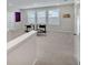 Cozy loft area featuring comfortable seating, natural light, and a relaxing atmosphere at 5715 Woodland Sage Dr, Sarasota, FL 34238