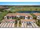 Aerial shot of the community showcasing the pool and golf course with lovely landscaping at 5720 Palmer Cir # 103, Bradenton, FL 34211