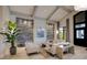 Elegant lounge area with comfortable seating, stylish decor, and plenty of natural light at 5720 Palmer Cir # 103, Bradenton, FL 34211