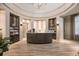 Elegant reception area featuring a curved desk and stylish decor at 5720 Palmer Cir # 103, Bradenton, FL 34211