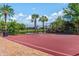 Enjoy friendly games on this community basketball court, surrounded by lush landscaping and a tranquil pond at 5749 Sunflower Cir, Sarasota, FL 34238