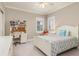 Cozy bedroom with study space, neutral tones, and comfortable decor at 5749 Sunflower Cir, Sarasota, FL 34238