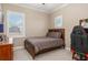 Comfortable bedroom with natural light, neutral colors, and a relaxing ambiance at 5749 Sunflower Cir, Sarasota, FL 34238