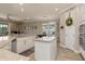 Spacious eat-in kitchen featuring granite counters, pantry and stainless appliances at 5749 Sunflower Cir, Sarasota, FL 34238