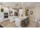 Bright and modern kitchen with large island, stainless steel appliances, and recessed lighting at 5749 Sunflower Cir, Sarasota, FL 34238