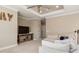 Cozy living room featuring a TV, ceiling fan, and comfortable seating arrangement at 5749 Sunflower Cir, Sarasota, FL 34238