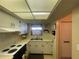Efficient kitchen design with white cabinets and ample countertop space at 6072 Arlene Way # 6072, Bradenton, FL 34207