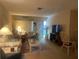 Inviting living room with comfortable seating and bright natural light at 6072 Arlene Way # 6072, Bradenton, FL 34207