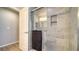 Modern bathroom featuring glass shower and gray tile at 6128 Nicole Dr, Sarasota, FL 34243
