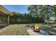Outdoor fire pit situated in the backyard perfect for entertaining at 6128 Nicole Dr, Sarasota, FL 34243