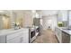 Modern kitchen with stainless steel appliances, sleek countertops, and stylish fixtures for a contemporary feel at 6128 Nicole Dr, Sarasota, FL 34243