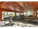 Covered picnic area with multiple tables and grill for community use at 6128 Nicole Dr, Sarasota, FL 34243