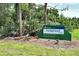 Longwood Park sign with lush trees and green grass, promoting community at 6128 Nicole Dr, Sarasota, FL 34243