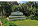 Entrance sign of Longwood Run community surrounded by lush greenery at 6128 Nicole Dr, Sarasota, FL 34243
