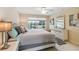 Bright and airy bedroom features natural light and neutral colors and modern finishes at 6209 Erice St, Venice, FL 34293