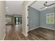 Bright bedroom with hardwood flooring and plantation shutters; great natural light at 6267 Crested Eagle Ln, Nokomis, FL 34275