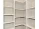 Bright walk-in closet with adjustable shelving and ample storage solutions for organization at 6267 Crested Eagle Ln, Nokomis, FL 34275