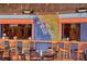 Vibrant restaurant interior featuring a painted map of the Florida coast on the wall at 6267 Midnight Pass Rd # 306, Sarasota, FL 34242
