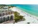 Aerial view of beachfront condos with nearby beach access at 6480 Midnight Pass Rd # 315, Sarasota, FL 34242