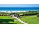 View from a unit of backyard leading to the Gulf of Mexico at 6480 Midnight Pass Rd # 315, Sarasota, FL 34242