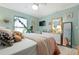 Bright bedroom with a pastel color scheme, and plenty of natural light at 6604 23Rd W Ave, Bradenton, FL 34209
