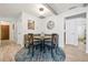 Bright breakfast nook features a booth, round table, and stylish rug, perfect for intimate dining experiences at 6604 23Rd W Ave, Bradenton, FL 34209