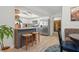Kitchen with stainless steel appliances, breakfast bar, and view to the dining area at 6604 23Rd W Ave, Bradenton, FL 34209
