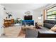 Inviting living room features modern decor, stylish furniture, and an adjacent dining area at 6604 23Rd W Ave, Bradenton, FL 34209